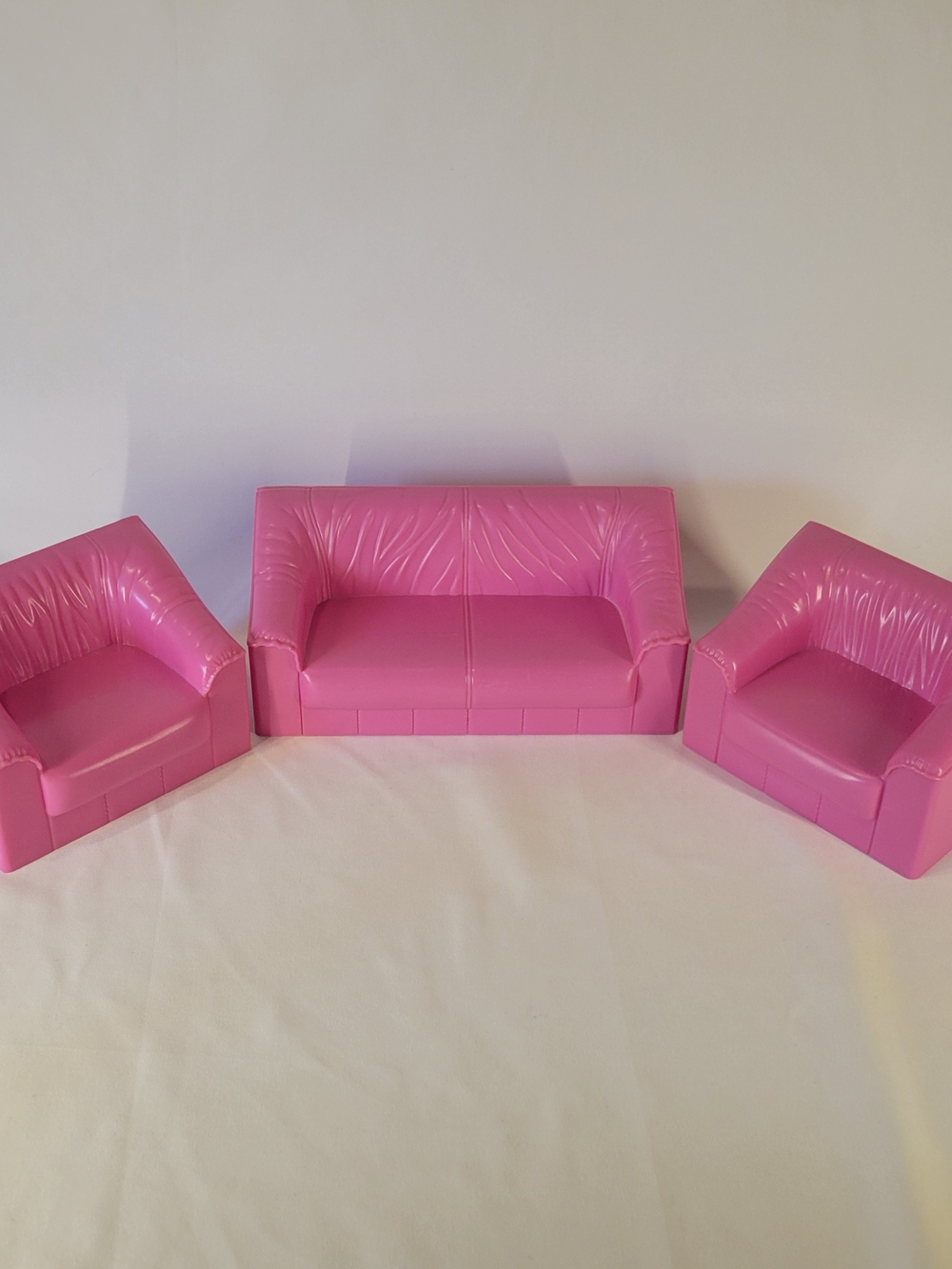 The Mattel Dreamhouse Barbie Pink Chair & Sofa Set